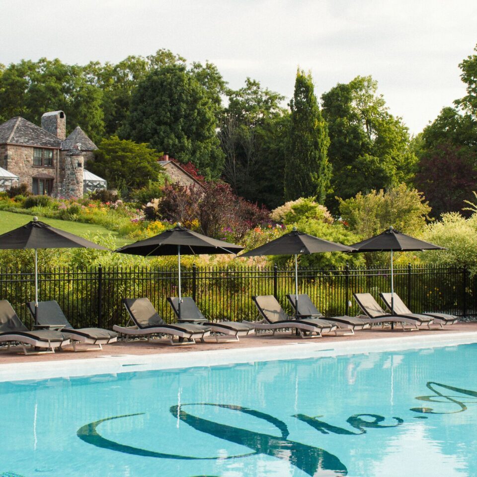 Welcome To Our Expansive In-Ground Seasonal Swimming Pool!