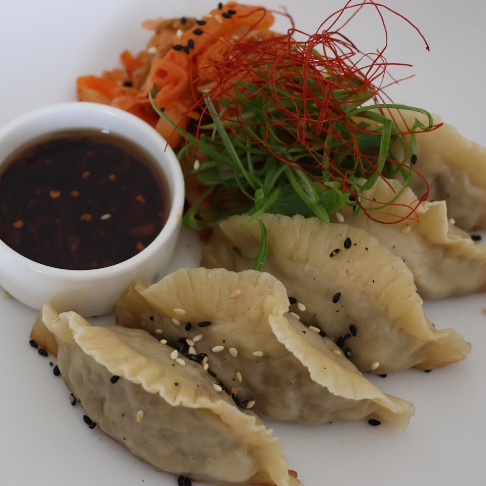 Handmade Dumplings with Chili Oil 